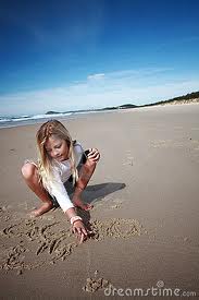 Girl drawing in the sand.jpeg