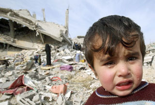 Palestinian Child outside his house.jpg