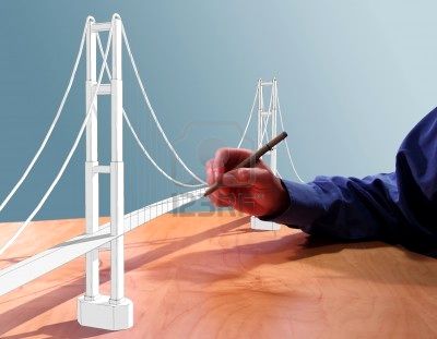 4569138-architect-drawing-a-suspension-bridge-in-3d-on-his-desk.jpg